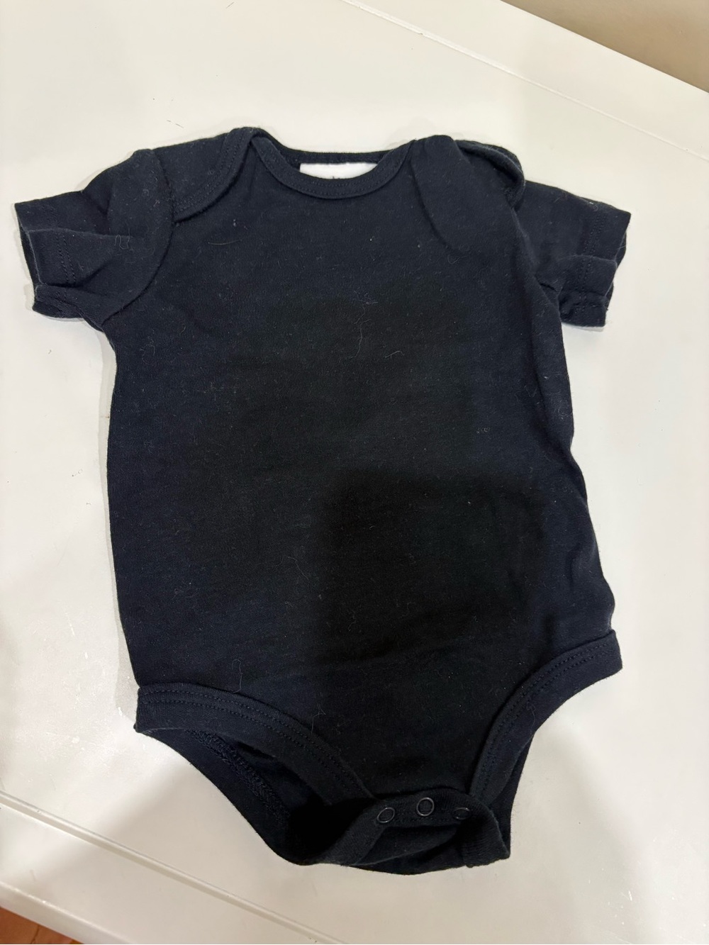 Nicole Miller Black Short-Sleeve Baby One-Piece